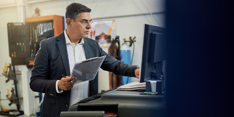 Inspector checking calibration data 